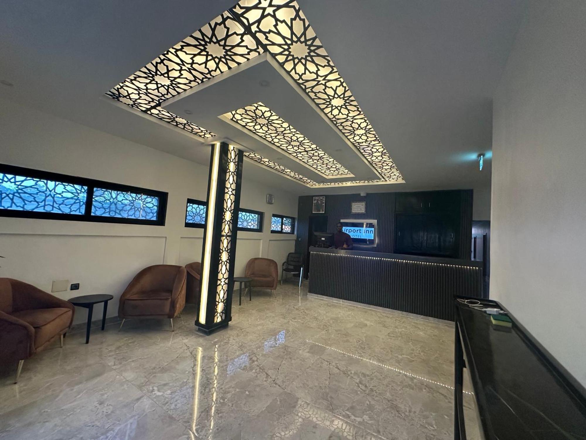 לומה Airport Inn Hotel מראה חיצוני תמונה